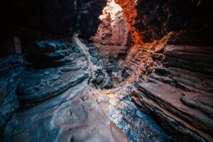 Karijini National Park Red Gorge. Outback Scenery in Western Australia Red rock gorge in Karijini National Park, Western Australia, under clear sky lays a popular hiking and adventure destination in WA’s Pilbara region.
